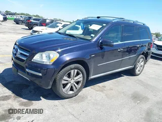 2012 Mercedes-Benz GL 350 with VIN 4JGBF2FEXCA776247, listed as a IAAI auction lot 41837519 with 119,421 mi miles and . Bid and sale history available at DreamBid. Image 2.