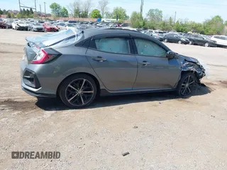 2021 Honda Civic Sport with VIN SHHFK7H49MU412153, listed as a IAAI auction lot 42105884 with 44,000 mi miles and . Bid and sale history available at DreamBid. Image 4.