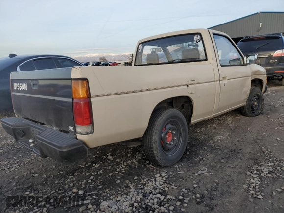 1986 Nissan Hardbody E z VIN JN6ND11S1GW037479, wystawiony jako Copart lot #81775934 z przebiegiem 389 841 mil mil oraz Szkoda całkowita • Salvage title. Historia ofert i sprzedaży dostępna na DreamBid. Obrazek 3.