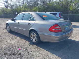 2003 Mercedes-Benz E-Class 3.2L with VIN WDBUF65J93X099223, listed as a IAAI auction lot 42033473 with 230,758 mi miles. Bid and sale history available at carsss.com. Image 3.
