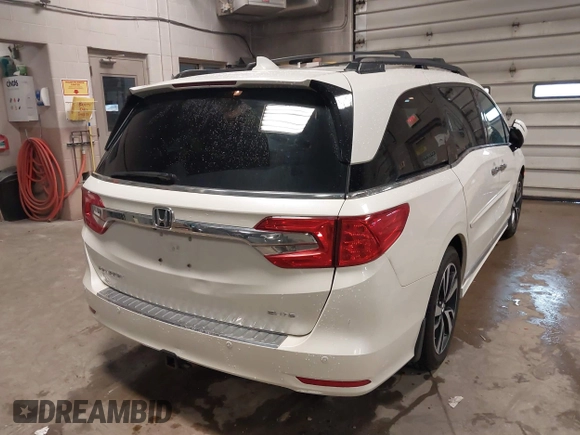 2018 Honda Odyssey Elite with VIN 5FNRL6H96JB027498, listed as a IAAI auction lot 41934458 with 80,653 mi miles. Bid and sale history available at carsss.com. Image 4.
