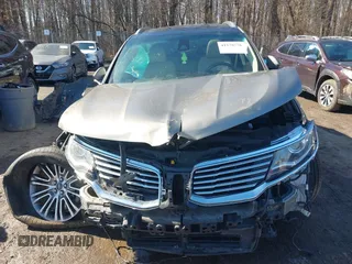 2016 Lincoln MKX Reserve with VIN 2LMTJ6LR7GBL90370, listed as a IAAI auction lot 41578776 with Not Provided miles and . Bid and sale history available at DreamBid. Image 13.