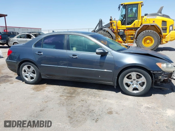 2005 Acura RL z VIN JH4KB16505C012679, wystawiony jako IAAI lot #41976411 z przebiegiem 103 342 mil mil oraz . Historia ofert i sprzedaży dostępna na DreamBid. Obrazek 14.