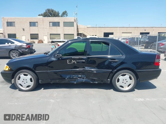 1999 Mercedes-Benz C with VIN WDBHA33G3XF889442, listed as a IAAI auction lot 42403800 with 82,075 mi miles and . Bid and sale history available at DreamBid. Image 14.