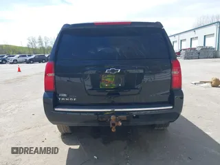 2015 Chevrolet Tahoe LTZ with VIN 1GNSKCKC8FR514671, listed as a IAAI auction lot 42157084 with 182,665 mi miles and . Bid and sale history available at DreamBid. Image 16.