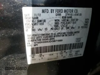 2013 Ford Explorer z VIN 1FM5K8B82DGB71889, wystawiony jako Copart lot #58262045 z przebiegiem 165 476 mil mil oraz Szkoda całkowita • Salvage title. Historia ofert i sprzedaży dostępna na DreamBid. Obrazek 13.