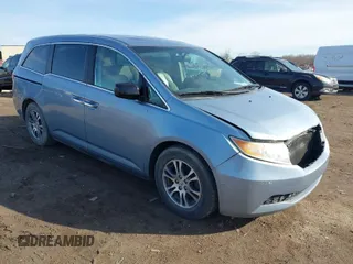 2011 Honda Odyssey EX-L with VIN 5FNRL5H68BB029724, listed as a IAAI auction lot 41854698 with 171,600 mi miles and . Bid and sale history available at carsss.com. Image 1.