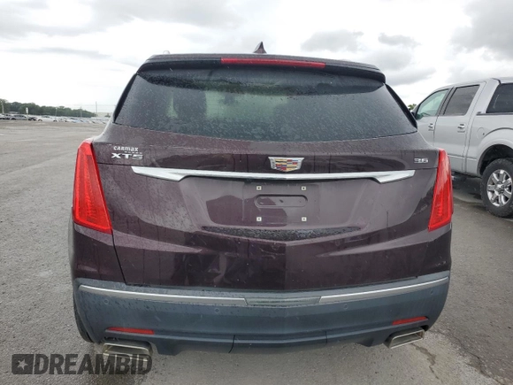 2018 Cadillac XT5 Premium Luxury FWD z VIN 1GYKNERS5JZ127703, wystawiony jako Copart lot #58315215 z przebiegiem Nie podano mil oraz Szkoda całkowita • Salvage title. Historia ofert i sprzedaży dostępna na DreamBid. Obrazek 6.