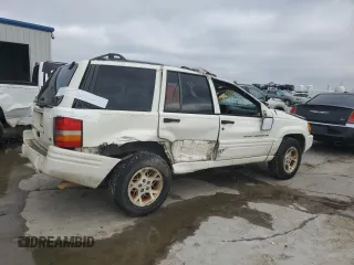 1997 Jeep Grand Cherokee Limited with VIN 1J4GX78YXVC716353, listed as a Copart auction lot 85207974 with 115,527 mi miles and Salvage Title. Bid and sale history available at carsss.com. Image 3.