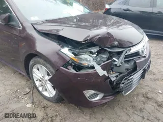 2014 Toyota Avalon Limited with VIN 4T1BK1EB9EU133483, listed as a IAAI auction lot 41744776 with 102,987 mi miles. Bid and sale history available at carsss.com. Image 6.