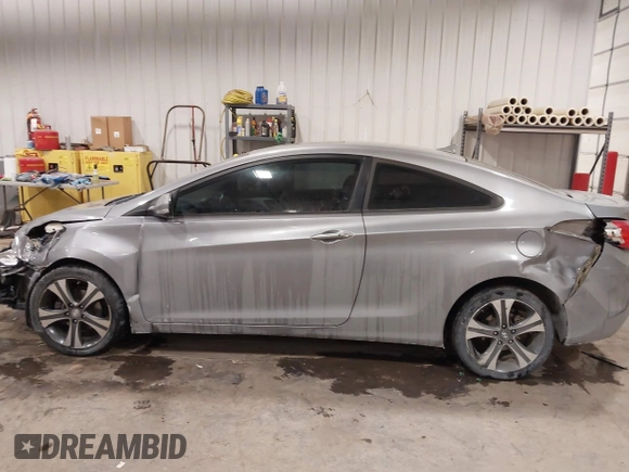 2013 Hyundai Elantra Coupe GS PZEV with VIN KMHDH6AE6DU000893, listed as a IAAI auction lot 41613994 with 94,388 mi miles. Bid and sale history available at carsss.com. Image 15.