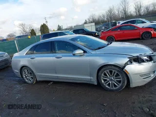 2013 Lincoln MKZ with VIN 3LN6L2JK4DR806860, listed as a IAAI auction lot 41448081 with 159,665 mi miles. Bid and sale history available at carsss.com. Image 13.
