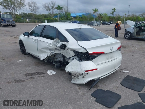 2022 Honda Civic Sport z VIN 2HGFE2F58NH560122, wystawiony jako IAAI lot #41193826 z przebiegiem 50 005 mil mil oraz . Historia ofert i sprzedaży dostępna na DreamBid. Obrazek 3.