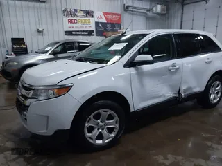 2014 Ford Edge SEL z VIN 2FMDK4JC9EBB06783, wystawiony jako IAAI lot #42047206 z przebiegiem 125 963 mil mil oraz . Historia ofert i sprzedaży dostępna na DreamBid. Obrazek 18.