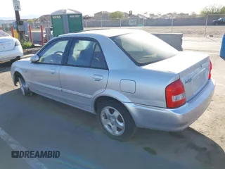 2002 Mazda Protege DX with VIN JM1BJ225X20639872, listed as a IAAI auction lot 41712272 with 145,118 mi miles and . Bid and sale history available at DreamBid. Image 3.