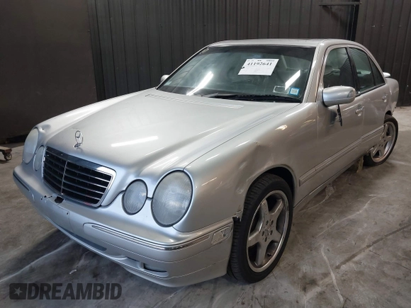 2002 Mercedes-Benz E-Class with VIN WDBJF82J52X062526, listed as a IAAI auction lot 41192641 with 126,352 mi miles. Bid and sale history available at carsss.com. Image 18.