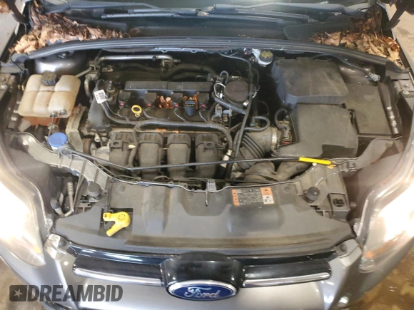 2014 Ford Focus Titanium z VIN 1FADP3N27EL462950, wystawiony jako Copart lot #65207155 z przebiegiem 34 058 mil mil oraz Szkoda całkowita • Salvage title. Historia ofert i sprzedaży dostępna na DreamBid. Obrazek 11.