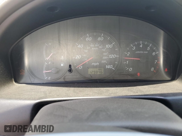 2002 Mazda Protege DX z VIN JM1BJ225020537013, wystawiony jako Copart lot #56952495 z przebiegiem 129 846 mil mil oraz Czysty tytuł • Clean title. Historia ofert i sprzedaży dostępna na DreamBid. Obrazek 9.