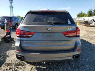 2015 BMW X5 xDrive35i z VIN 5UXKR0C57F0K61171, wystawiony jako Copart lot #57555405 z przebiegiem 119 664 mil mil oraz Szkoda całkowita • Salvage title. Historia ofert i sprzedaży dostępna na DreamBid. Obrazek 6.