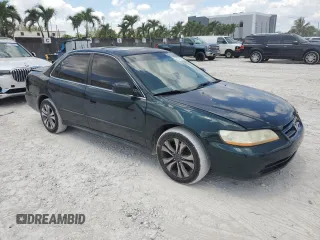 2001 Honda Accord EX z VIN 1HGCG16541A018192, wystawiony jako Copart lot #57105765 z przebiegiem 173 270 mil mil oraz Szkoda całkowita • Salvage title. Historia ofert i sprzedaży dostępna na DreamBid. Obrazek 4.