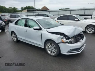 2017 Volkswagen Jetta SEL z VIN 3VWL17AJ6HM412147, wystawiony jako Copart lot #63333085 z przebiegiem Nie podano mil oraz Szkoda całkowita • Salvage title. Historia ofert i sprzedaży dostępna na DreamBid. Obrazek 4.