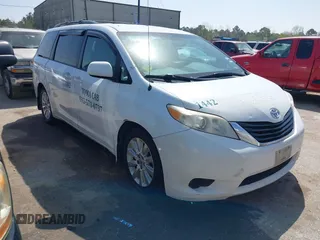 2014 Toyota Sienna LE with VIN 5TDJK3DC5ES081232, listed as a IAAI auction lot 41789629 with 397,033 mi miles. Bid and sale history available at carsss.com. Image 1.