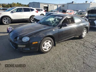 1997 Toyota Celica with VIN JT2DB02T8V0065147, listed as a Copart auction lot 71396474 with 143,677 mi miles and Clean title. Bid and sale history available at DreamBid. Image 1.