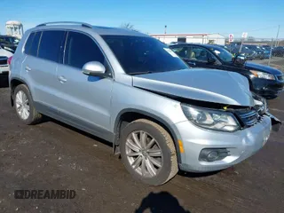 2016 Volkswagen Tiguan SEL z VIN WVGBV7AX5GW521829, wystawiony jako IAAI lot #41582637 z przebiegiem 72 899 mil mil oraz . Historia ofert i sprzedaży dostępna na DreamBid. Obrazek 1.
