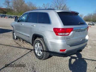 2013 Jeep Grand Cherokee Laredo with VIN 1C4RJFAG3DC586667, listed as a IAAI auction lot 42041524 with 100,635 mi miles. Bid and sale history available at carsss.com. Image 3.