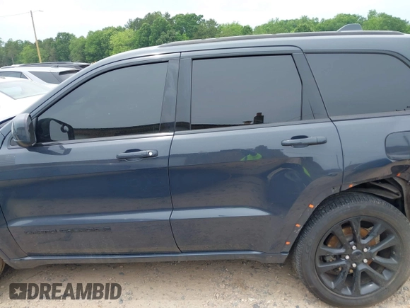 2018 Jeep Grand Cherokee Laredo with VIN 1C4RJFAG4JC303222, listed as a IAAI auction lot 42276244 with 83,585 mi miles and . Bid and sale history available at DreamBid. Image 14.