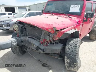 2015 Jeep Wrangler Unlimited Willys Wheeler with VIN 1C4BJWDG9FL750505, listed as a IAAI auction lot 41781762 with 139,000 mi miles and . Bid and sale history available at DreamBid. Image 6.