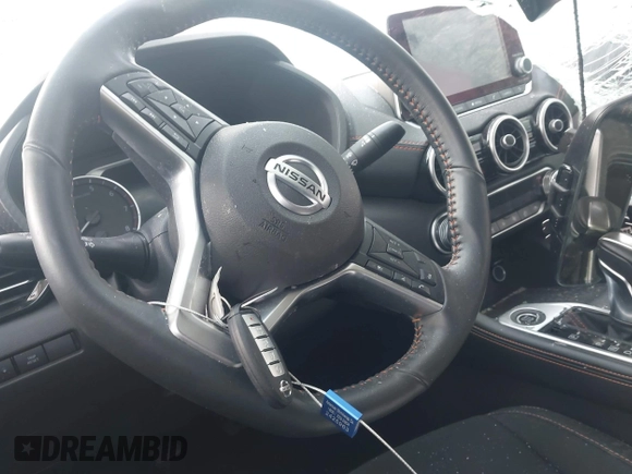 2022 Nissan Sentra SR z VIN 3N1AB8DV0NY313438, wystawiony jako IAAI lot #42076992 z przebiegiem Nie podano mil oraz . Historia ofert i sprzedaży dostępna na DreamBid. Obrazek 11.