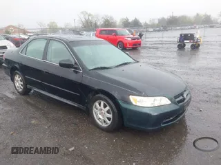 2002 Honda Accord SE z VIN 1HGCG56712A073712, wystawiony jako IAAI lot #41981247 z przebiegiem 221 992 mil mil oraz . Historia ofert i sprzedaży dostępna na DreamBid. Obrazek 1.