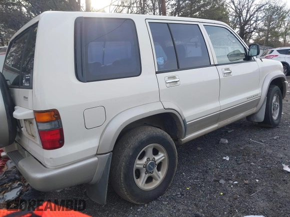 1999 Isuzu Trooper S with VIN JACDJ58X1X7928946, listed as a IAAI auction lot 41310880 with Not Provided miles and . Bid and sale history available at DreamBid. Image 4.