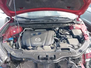 2015 Mazda CX-5 Grand Touring with VIN JM3KE4DY7F0477770, listed as a IAAI auction lot 41617849 with 106,135 mi miles. Bid and sale history available at carsss.com. Image 10.