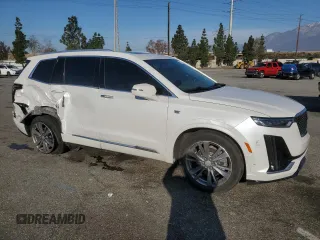 2022 Cadillac XT6 Premium Luxury with VIN 1GYKPFRS5NZ125360, listed as a Copart auction lot 45431165 with 47,511 mi miles and Salvage Title. Bid and sale history available at carsss.com. Image 4.