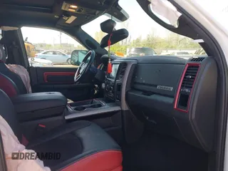 2018 Ram 1500 Rebel with VIN 1C6RR7YT3JS133384, listed as a IAAI auction lot 42097247 with 77,621 mi miles and . Bid and sale history available at DreamBid. Image 5.