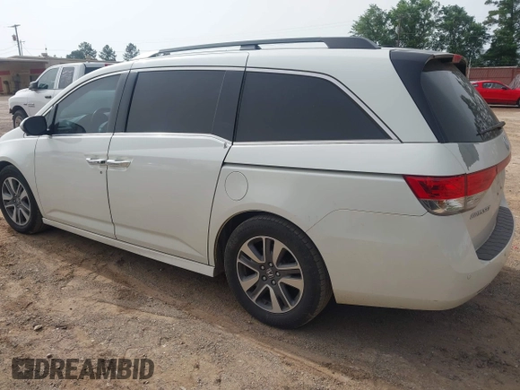 2015 Honda Odyssey Touring Elite with VIN 5FNRL5H96FB045968, listed as a IAAI auction lot 42263637 with 207,637 mi miles and . Bid and sale history available at DreamBid. Image 3.