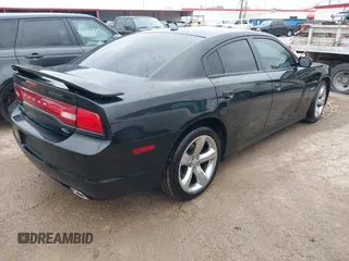 2014 Dodge Charger RT with VIN 2C3CDXCT4EH340887, listed as a IAAI auction lot 42113933 with 143,897 mi miles. Bid and sale history available at carsss.com. Image 4.