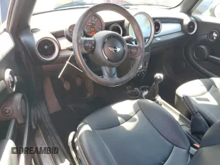 2015 MINI Convertible with VIN WMWZN3C56FT266838, listed as a Copart auction lot 50250745 with 60,331 mi miles and Salvage title. Bid and sale history available at DreamBid. Image 8.