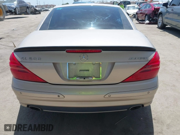 2005 Mercedes-Benz SL 500 z VIN WDBSK75F75F090730, wystawiony jako IAAI lot #42278730 z przebiegiem 83 765 mil mil oraz . Historia ofert i sprzedaży dostępna na DreamBid. Obrazek 17.