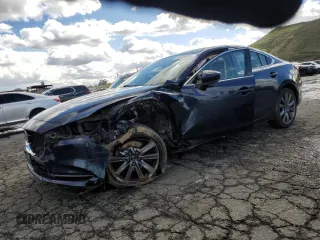 2019 Mazda 6 Grand Touring with VIN JM1GL1TY5K1503310, listed as a Copart auction lot 49169685 with 72,057 mi miles and Salvage Title. Bid and sale history available at carsss.com. Image 1.