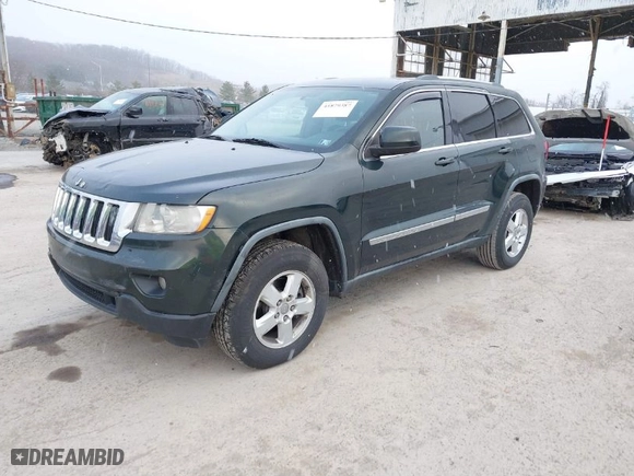 2011 Jeep Grand Cherokee Laredo with VIN 1J4RR4GG9BC546198, listed as a IAAI auction lot 41879387 with 190,973 mi miles. Bid and sale history available at carsss.com. Image 2.