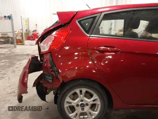 2016 Ford Fiesta SE with VIN 3FADP4EJ4GM114764, listed as a IAAI auction lot 40164385 with 144,336 mi miles. Bid and sale history available at carsss.com. Image 18.