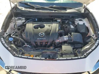 2020 Mazda CX-30 with VIN 3MVDMABLXLM127549, listed as a Copart auction lot 79727114 with 71,311 mi miles and Clean Title. Bid and sale history available at DreamBid. Image 12.