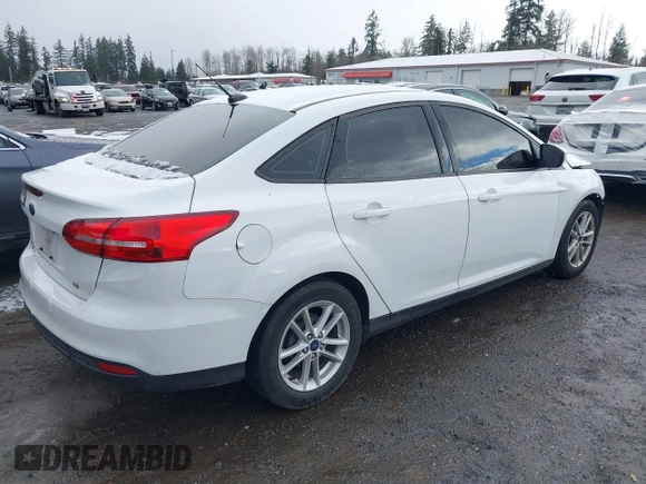 2016 Ford Focus SE with VIN 1FADP3F24GL337504, listed as a IAAI auction lot 41429358 with 91,458 mi miles and . Bid and sale history available at DreamBid. Image 4.