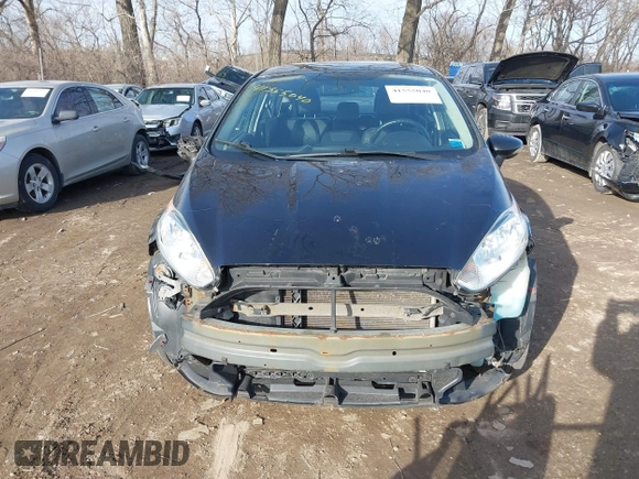 2014 Ford Fiesta Titanium z VIN 3FADP4FJXEM127644, wystawiony jako IAAI lot #41555040 z przebiegiem 107 046 mil mil oraz . Historia ofert i sprzedaży dostępna na DreamBid. Obrazek 13.
