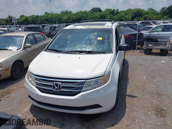2012 Honda Odyssey EX-L with VIN 5FNRL5H63CB063684, listed as a IAAI auction lot 42576742 with 170,656 mi miles and . Bid and sale history available at DreamBid. Image 12.