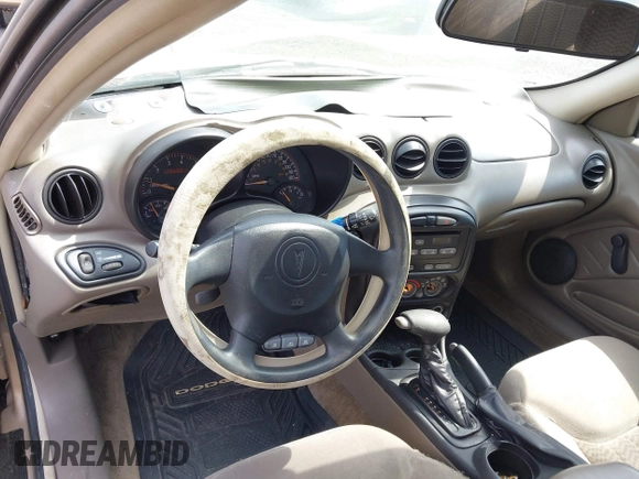 2004 Pontiac Grand Am SE z VIN 1G2NE52F64C108508, wystawiony jako IAAI lot #42143643 z przebiegiem 126 693 mil mil oraz . Historia ofert i sprzedaży dostępna na DreamBid. Obrazek 13.