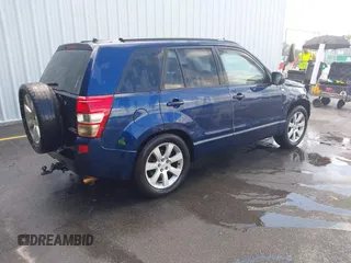 2010 Suzuki Grand Vitara Limited z VIN JS3TE1D9XA4100034, wystawiony jako IAAI lot #42466762 z przebiegiem 189 428 mil mil oraz . Historia ofert i sprzedaży dostępna na DreamBid. Obrazek 4.